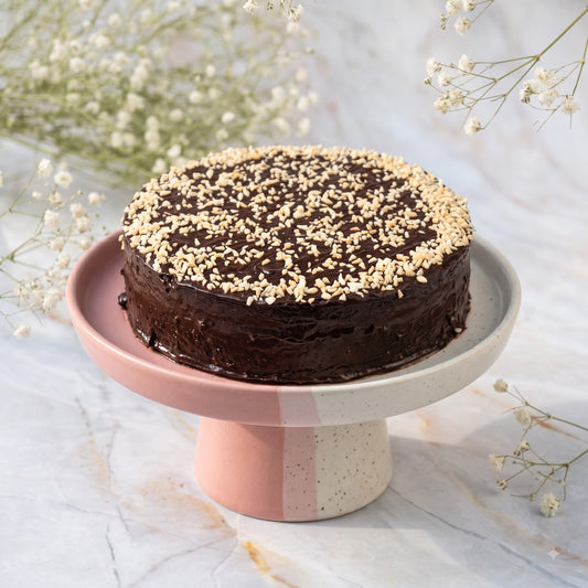 Vegan classic chocolate cake with glossy chocolate ganache by KuKClean